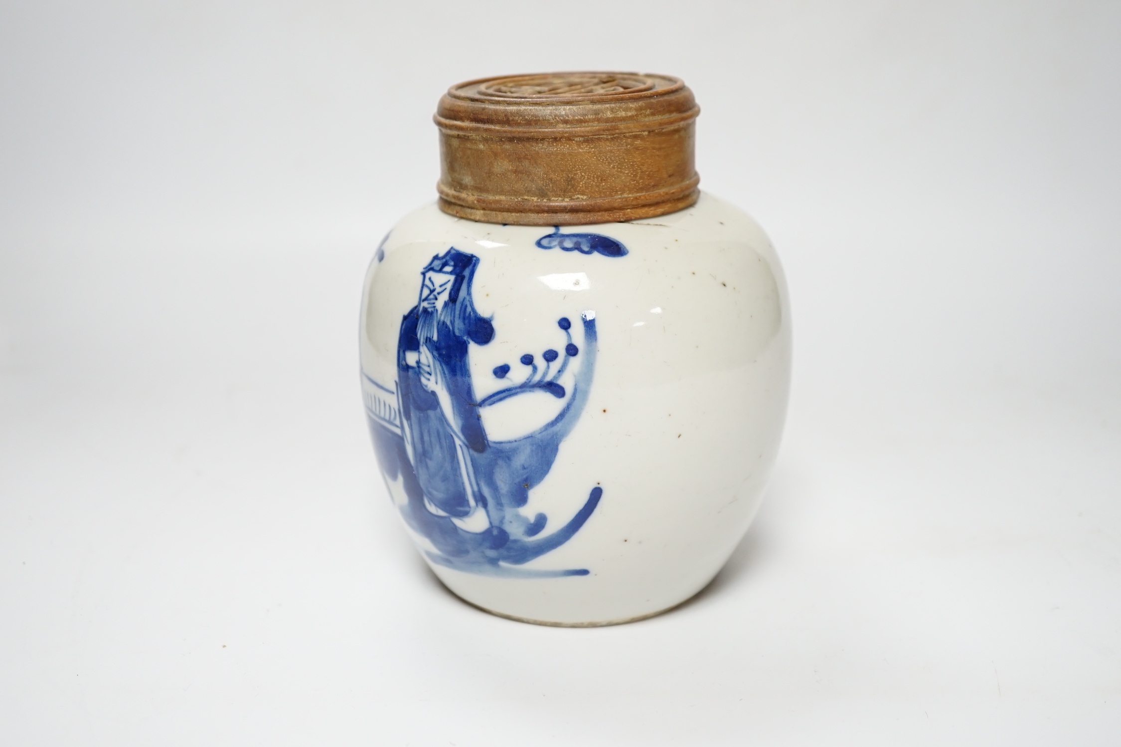 A Chinese blue and white jar, 19th century, with pierced hardwood lid, 15cm high